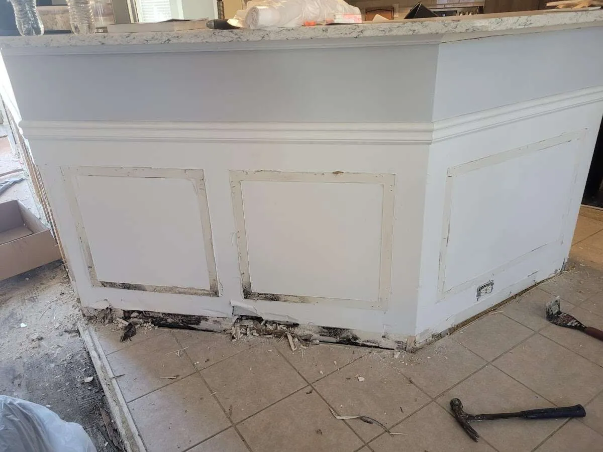 Water damage and mold on kitchen during Storm Damage Restoration in Orchards